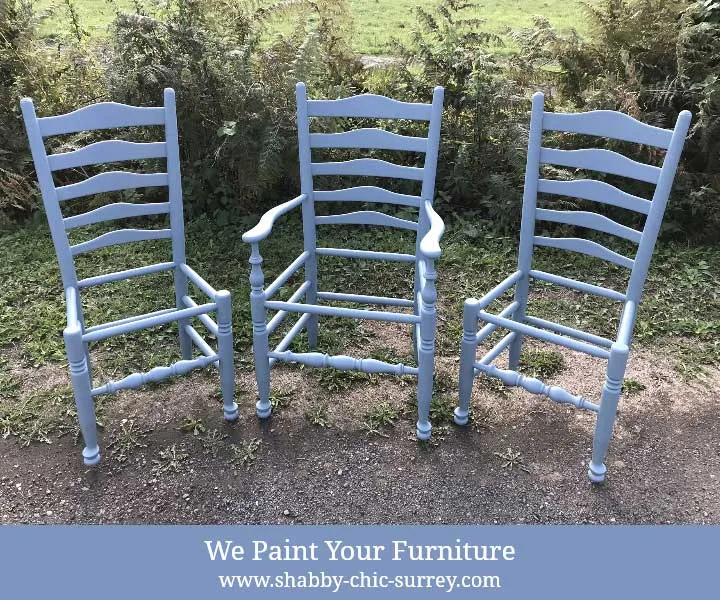 Painted chairs outside the workshop